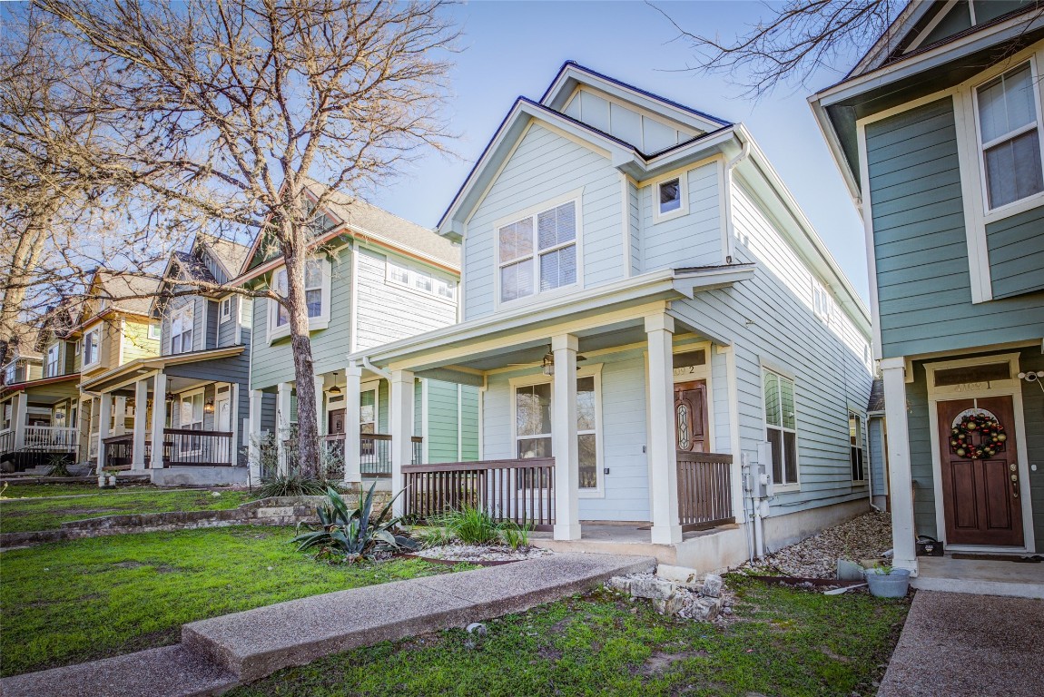 4109 East 12th Street, Unit 2 Austin, TX 78721 - Photo 2 of 39 front view of a house with a yard