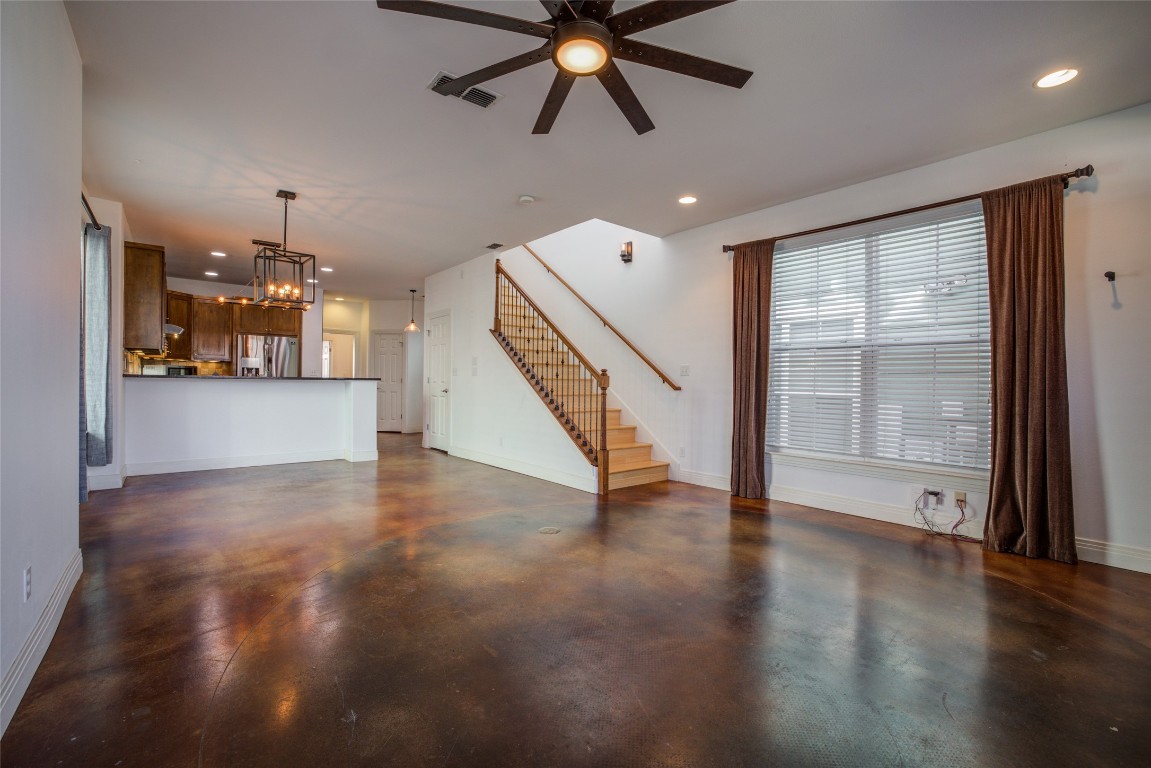 4109 East 12th Street, Unit 2 Austin, TX 78721 - Photo 6 of 39 a view of an empty room with wooden floor and a window