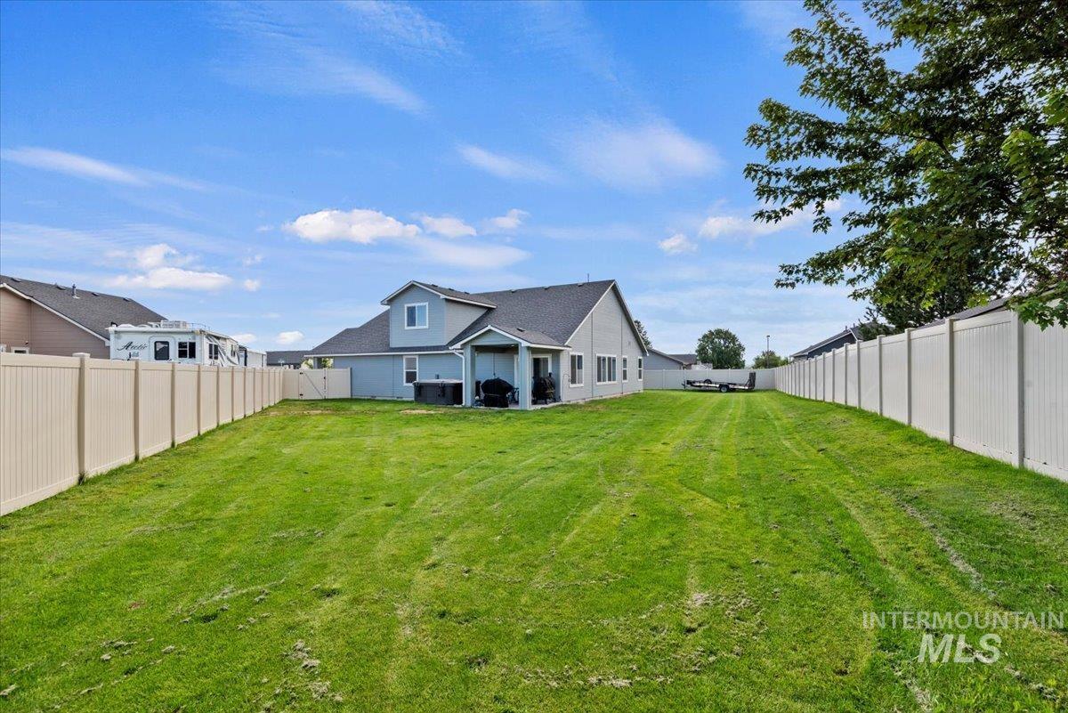 1211 Mahogany Street Parma, ID 83660 - Photo 26 of 30 Back of house featuring a fenced backyard