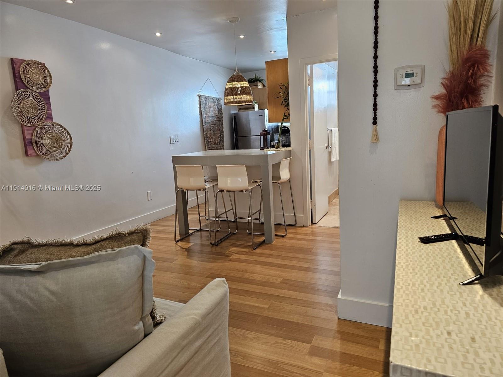 751 Collins Avenue, Unit 2 Miami Beach, FL 33139 - Photo 5 of 25 a view of dining room with furniture