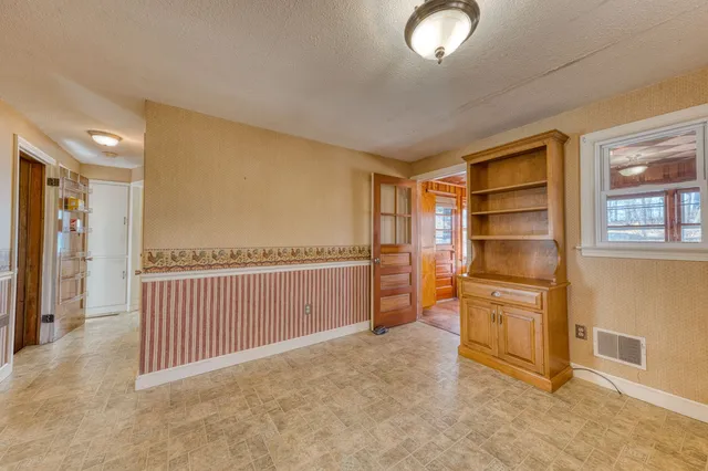 a view of a livingroom with furniture
