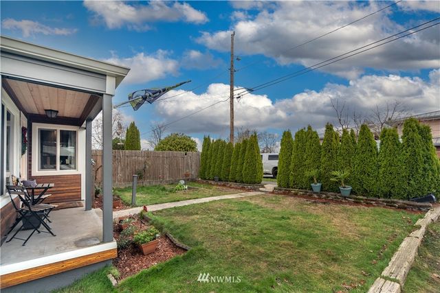 a view of a playground with basketball court