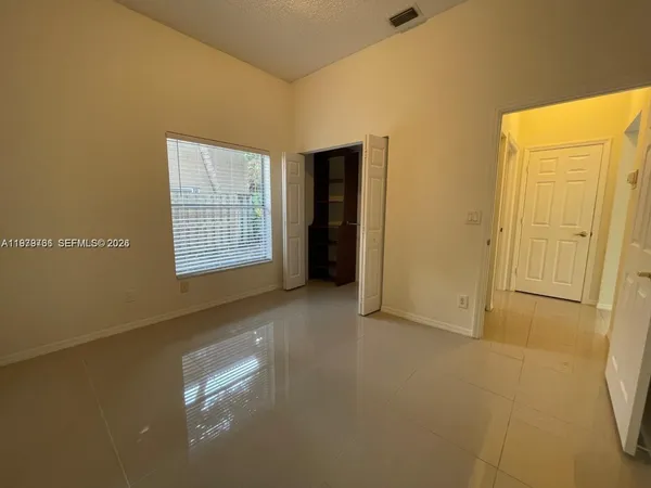 an empty room with windows