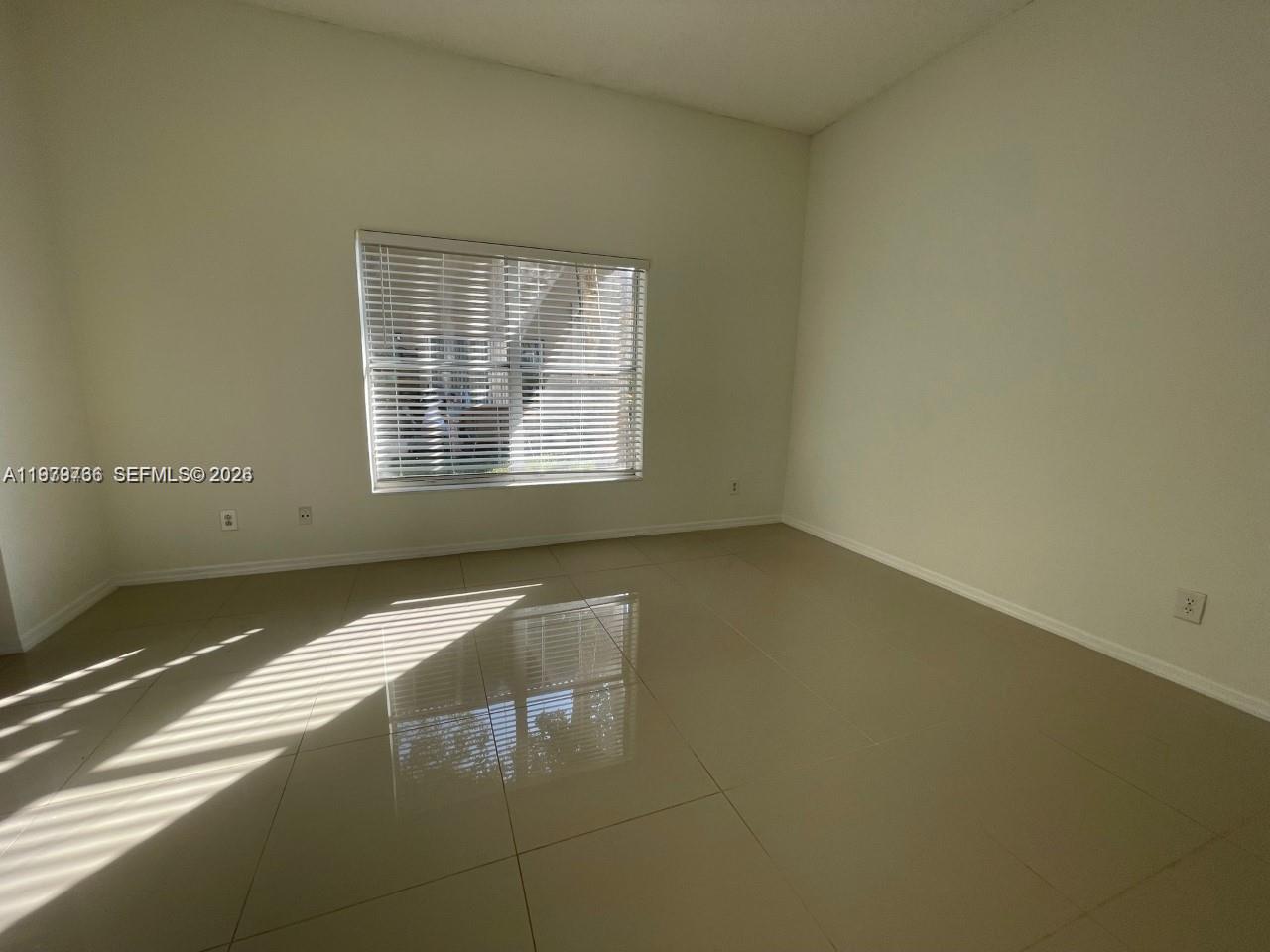 16309 Emerald Cove Road, Unit 16309 Weston, FL 33331 - Photo 22 of 41 a view of a room with window