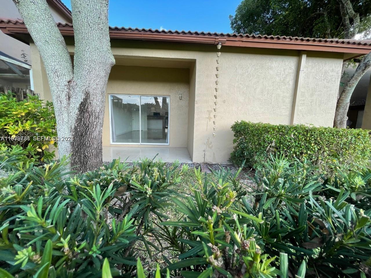 16309 Emerald Cove Road, Unit 16309 Weston, FL 33331 - Photo 31 of 41 an outdoor view of entrance