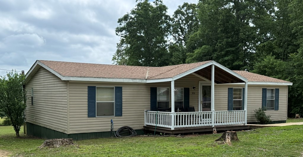 920 Pioneer Road Grimsley, TN 38565 - Photo 2 of 15 a front view of a house with a garden