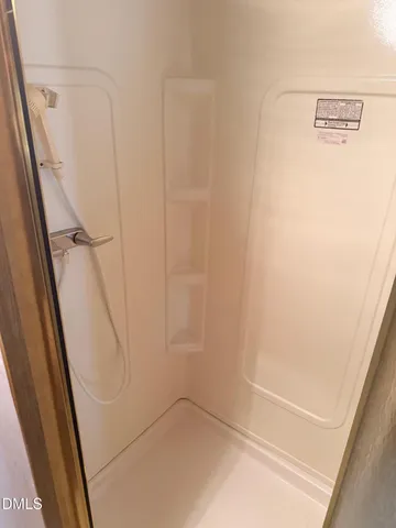 a kitchen with a sink and a refrigerator