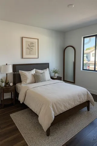 a building outdoor space with patio furniture and potted plants