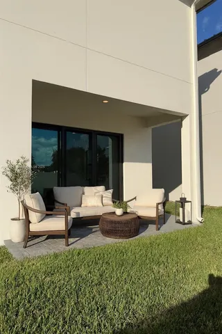 a kitchen with stainless steel appliances a refrigerator and a stove