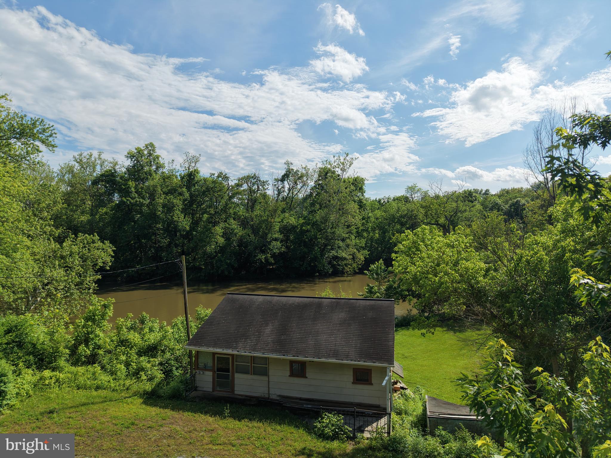 13726 Hopps Landing Road Hagerstown, MD 21740 - Photo 12 of 71 an aerial view of a house with garden space and trees