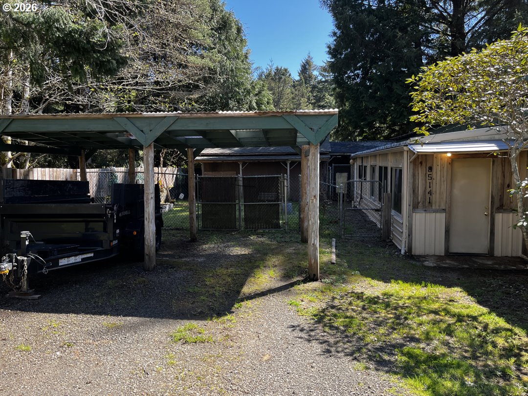 85141 Cedar Drive Florence, OR 97439 - Photo 3 of 37 a view of a car garage
