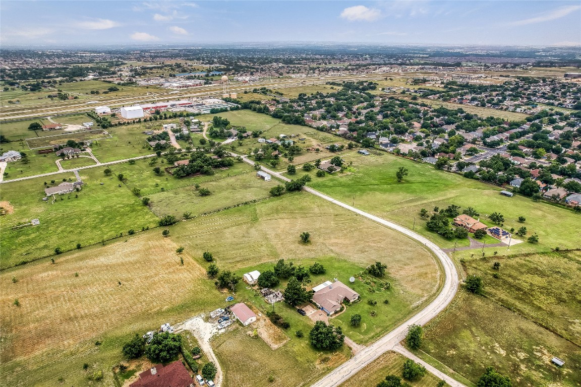 1931 Rowe Loop Pflugerville, TX 78660 - Photo 21 of 37 an aerial view of a residential houses with outdoor space