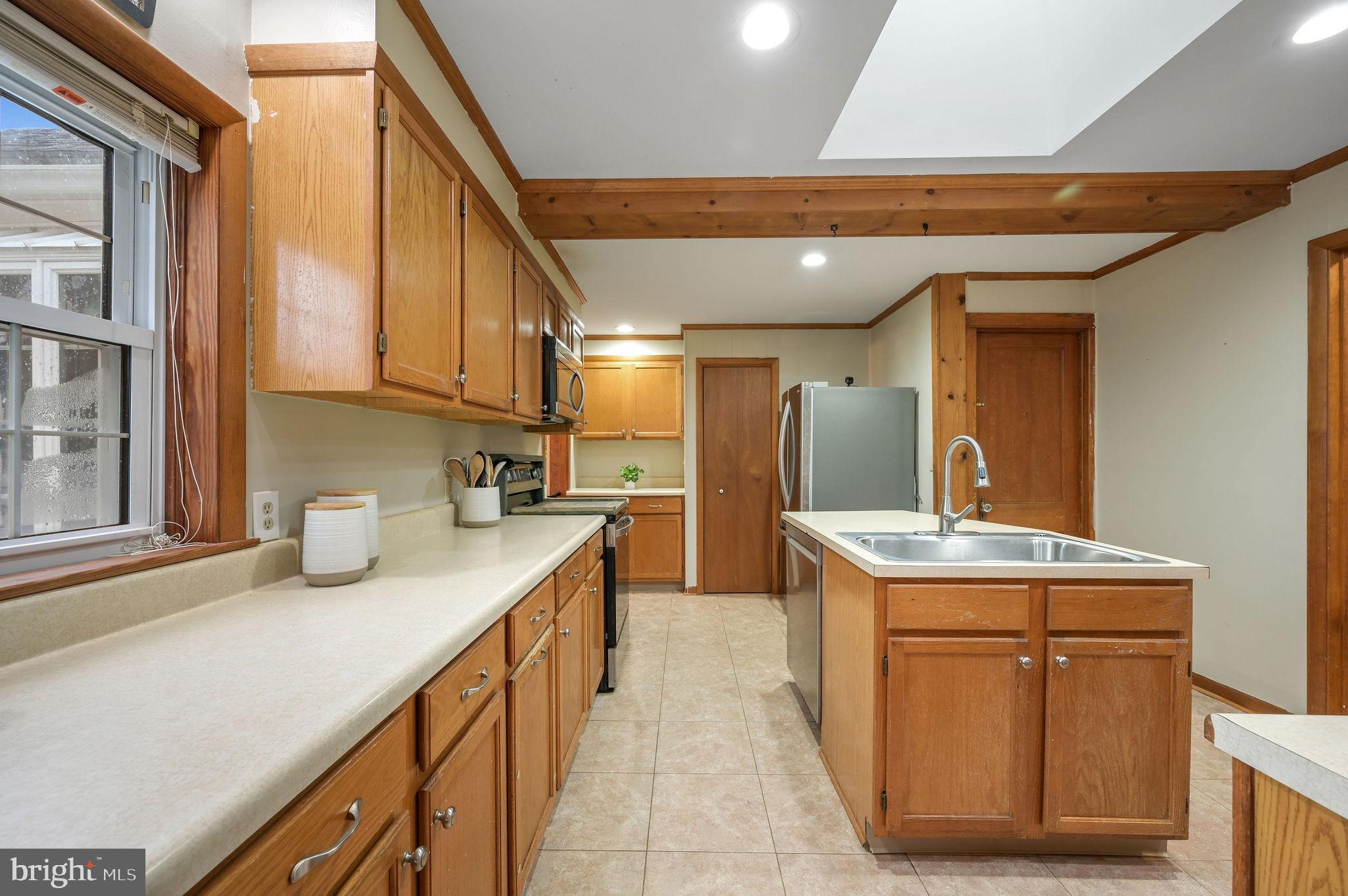 1023 South State Street Dover, DE 19901 - Photo 16 of 27 Kitchen with Skylight