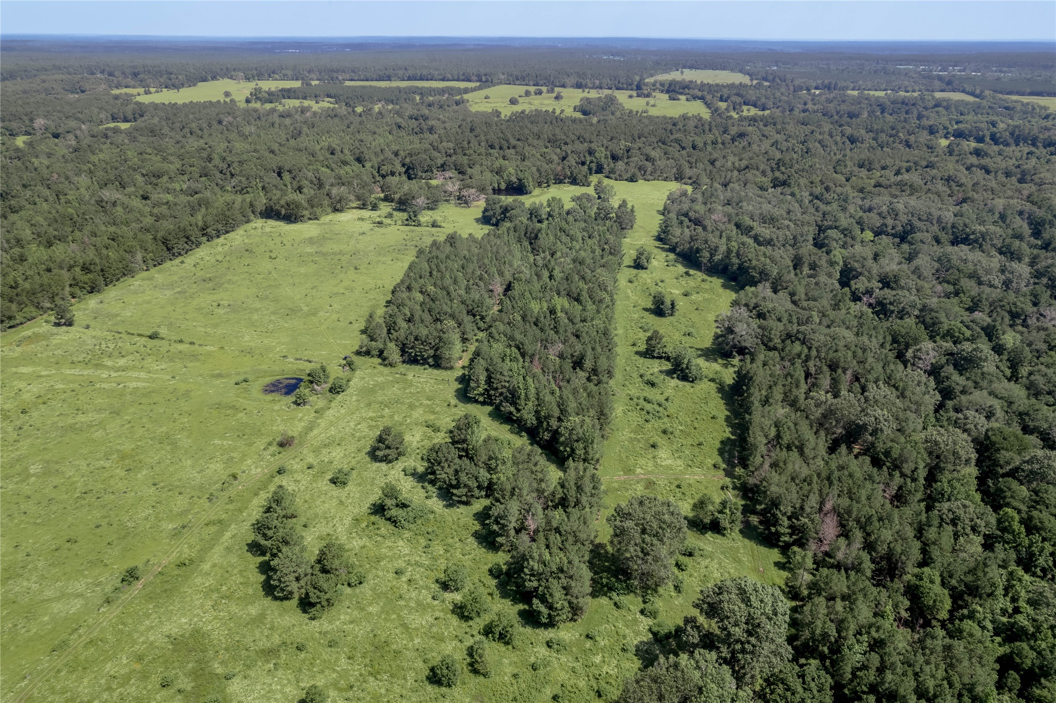 Tbd Neal Helton Road Kennard, TX 75847 - Photo 22 of 30 an aerial view of a houses with a lush green hillside
