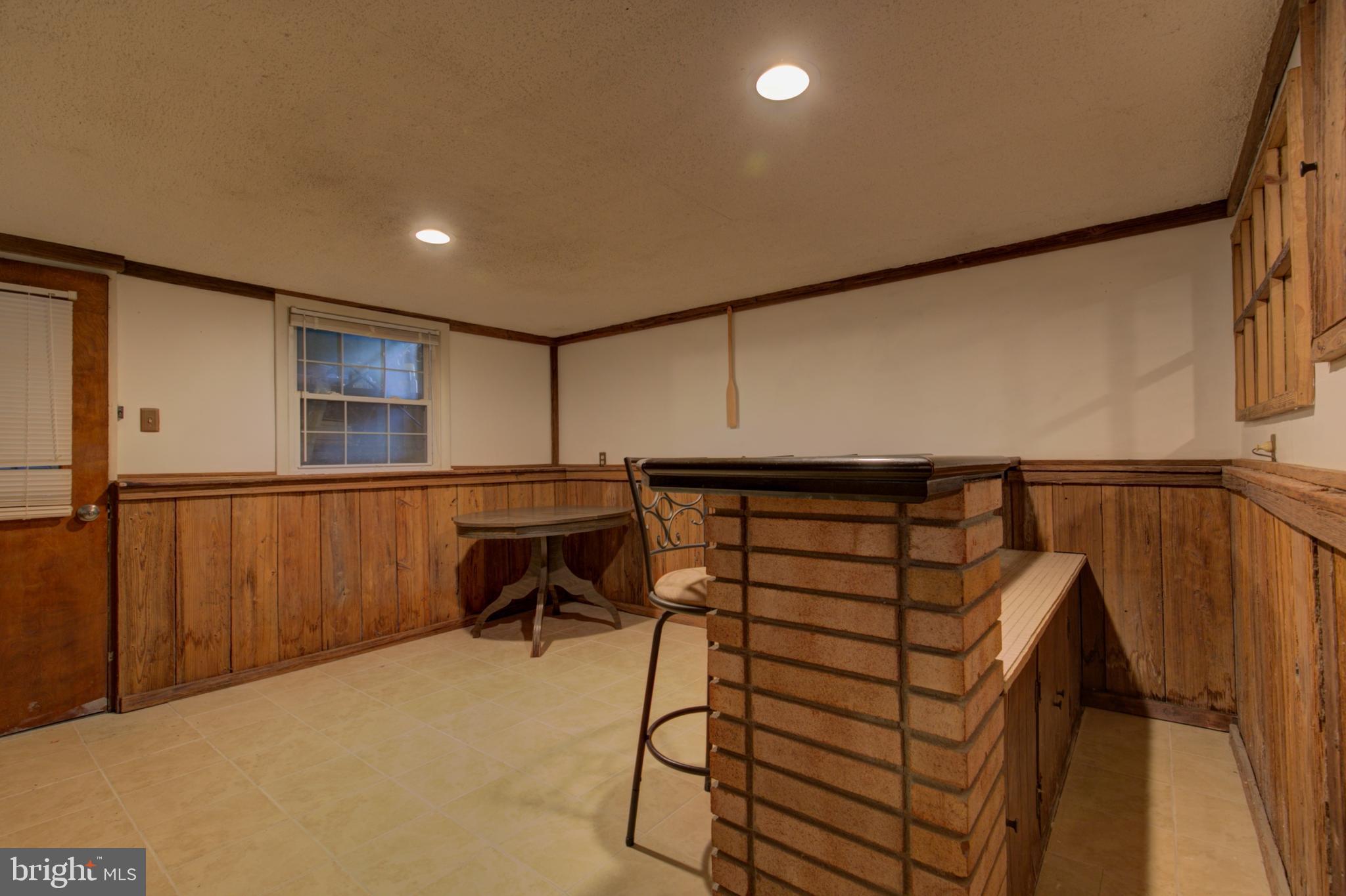 614 Mock Road Pottstown, PA 19464 - Photo 26 of 31 bar and game area in basement
