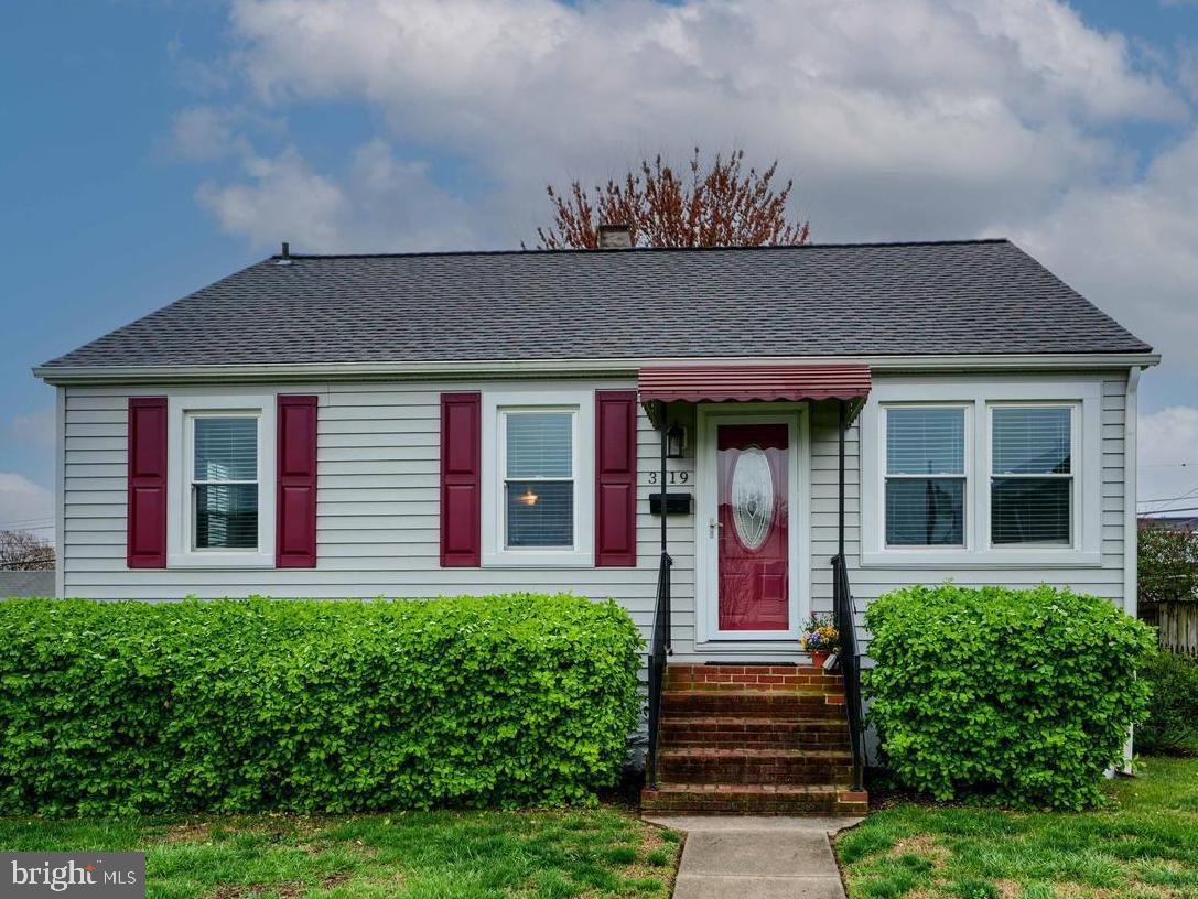 3119 White Way Road Baltimore, MD 21219 - Photo 1 of 41 front view of a house with a yard