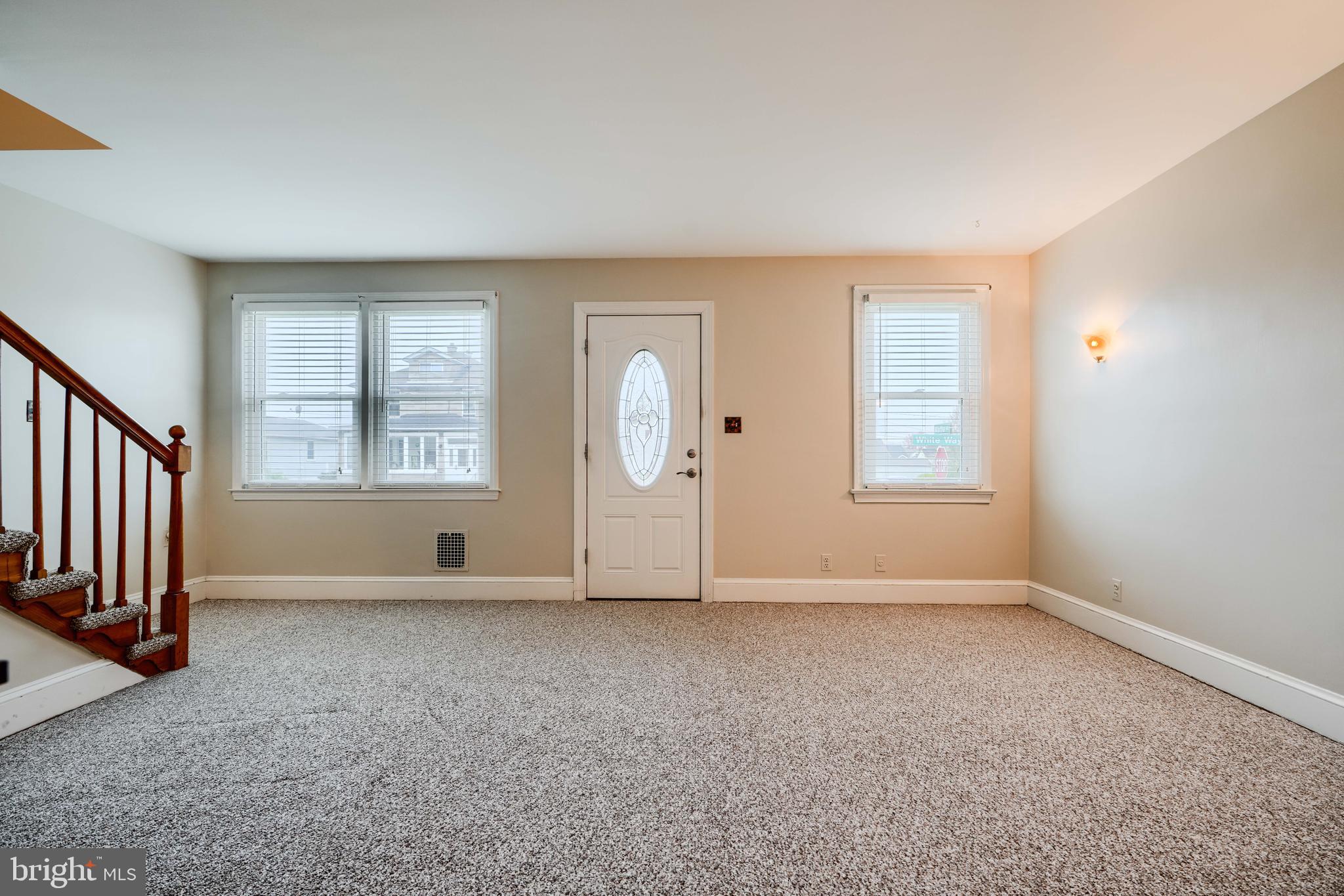 3119 White Way Road Baltimore, MD 21219 - Photo 4 of 41 an empty room with windows