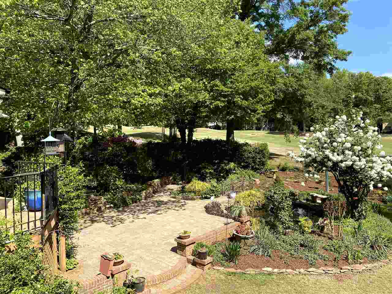 5109 Salem Ridge Road Holly Springs, NC 27540 - Photo 14 of 30 EASY CARE Perennial and shrubs throughout the property. Back Yard Paradise