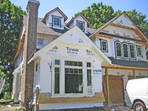 624 Willow Road Winnetka, IL 60093 - Photo 1 of 1 a front view of a house with a porch