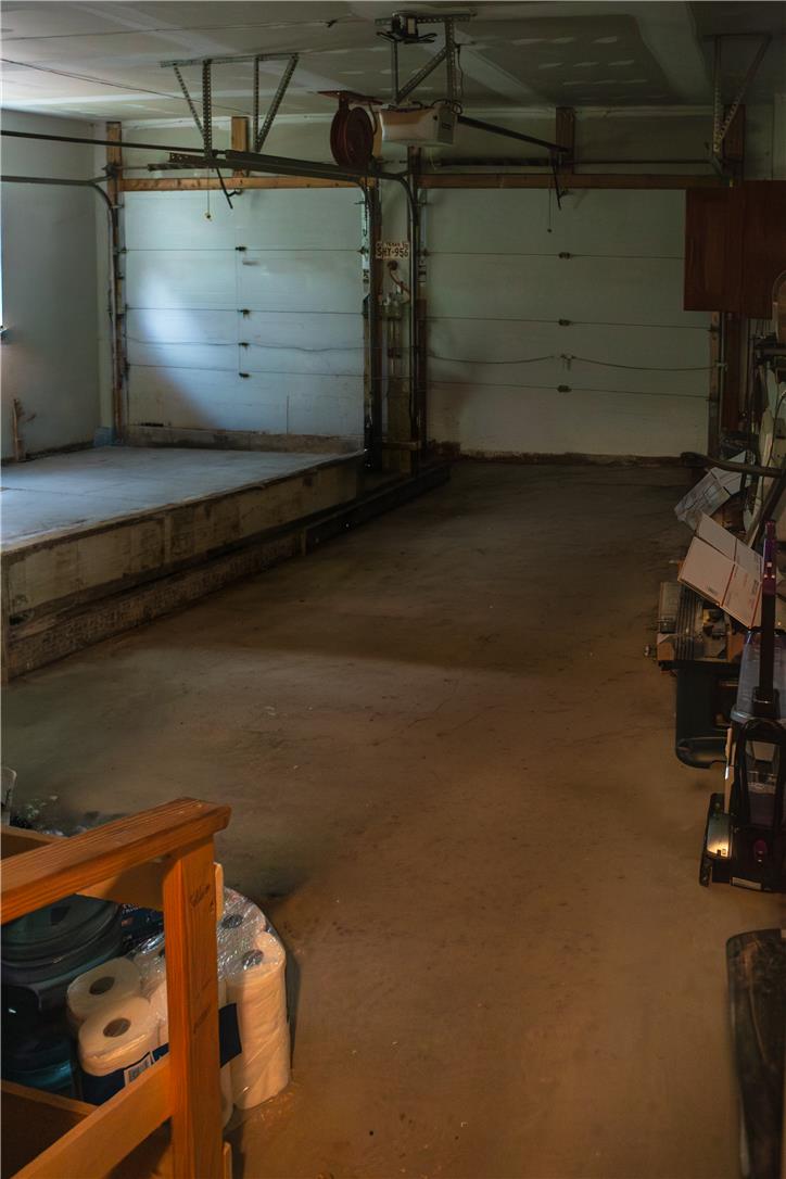 50 Anthony's Road White Haven, PA 18661 - Photo 45 of 57 Secure space with durable concrete flooring and dual bay doors, perfect for vehicles or storage.