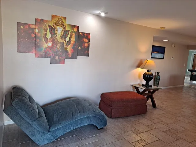 a living room with furniture and furniture