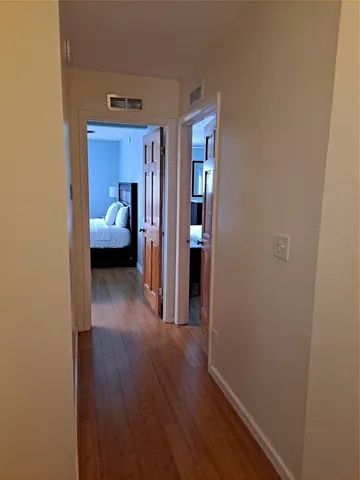 a view of a bedroom from a hallway