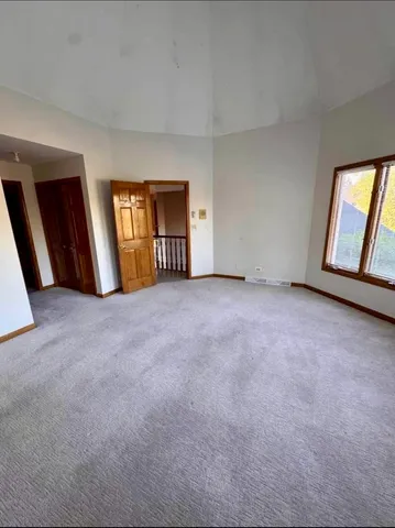 a view of swimming pool with seating space