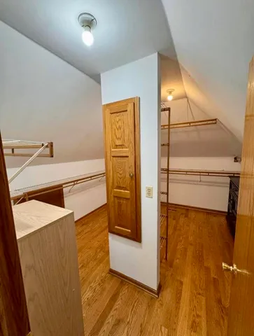 a bathroom with a double vanity sink and a toilet