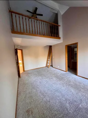 an empty room with large window