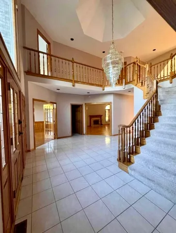 a view of room with wooden floor