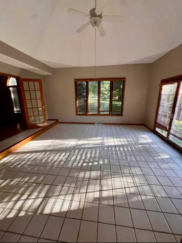 a kitchen with stainless steel appliances granite countertop a sink and cabinets