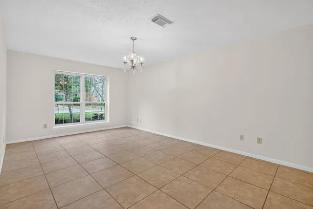 en empty room with windows