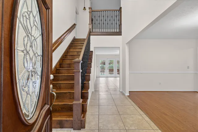 a view of an entryway with a front door