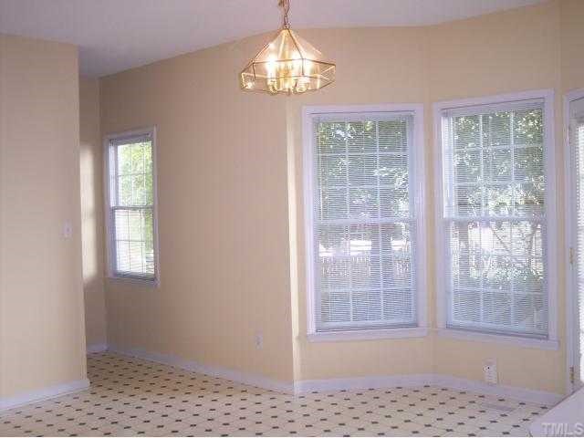 5154 Fairmead Circle Raleigh, NC 27613 - Photo 6 of 11 a view of an empty room with a window