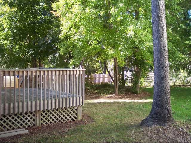 5154 Fairmead Circle Raleigh, NC 27613 - Photo 10 of 11 a view of a yard with a trees