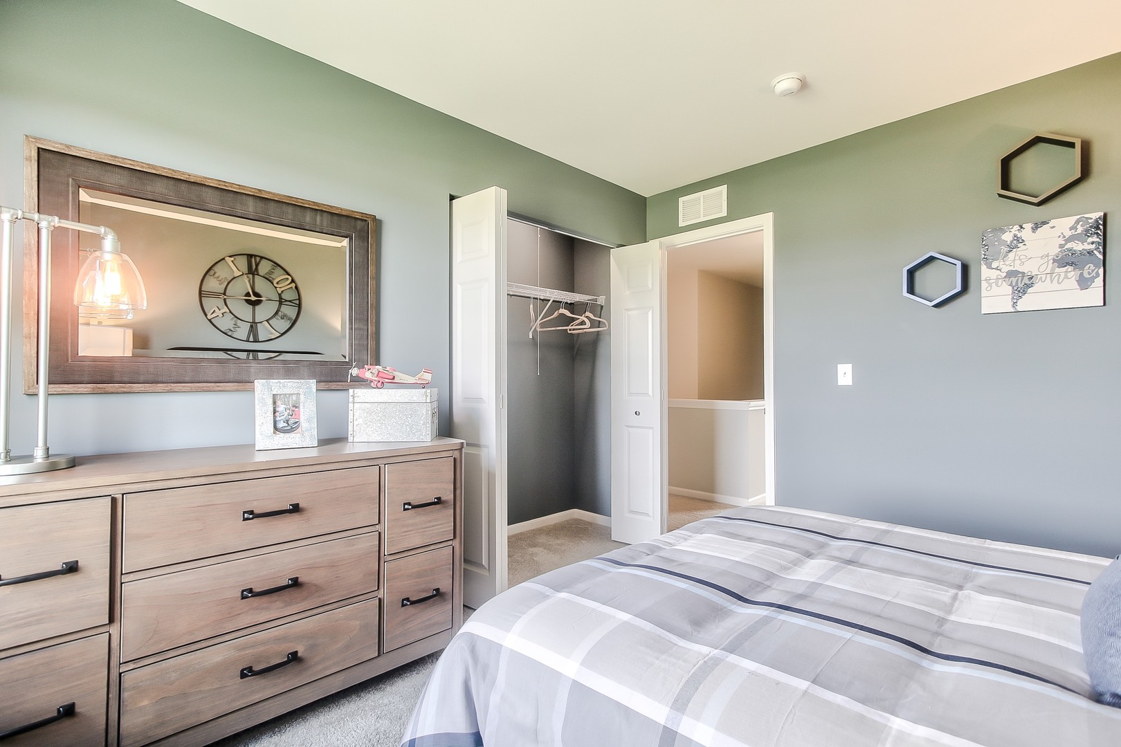 1343 Comstock Road South Elgin, IL 60177 - Photo 27 of 32 a bedroom with a bed and cabinets