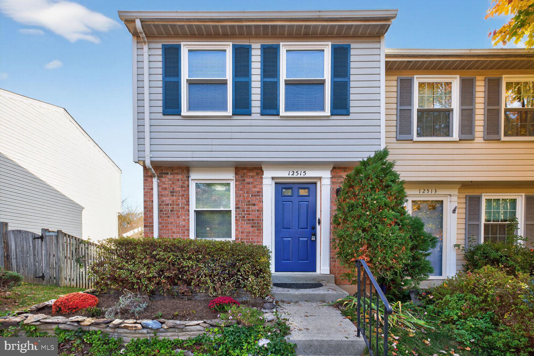 a front view of house with yard and outdoor seating