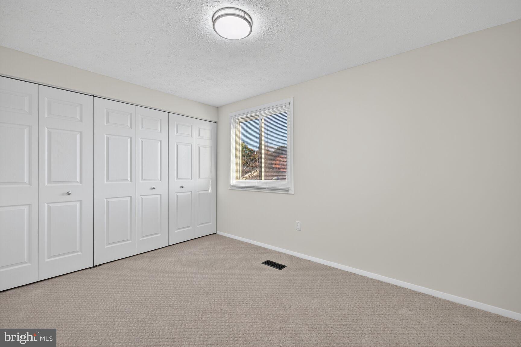 12515 Willow Spring Circle Germantown, MD 20874 - Photo 12 of 22 a view of an empty room