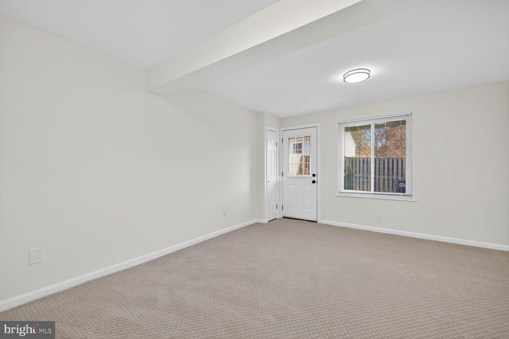12515 Willow Spring Circle Germantown, MD 20874 - Photo 15 of 22 an empty room with windows