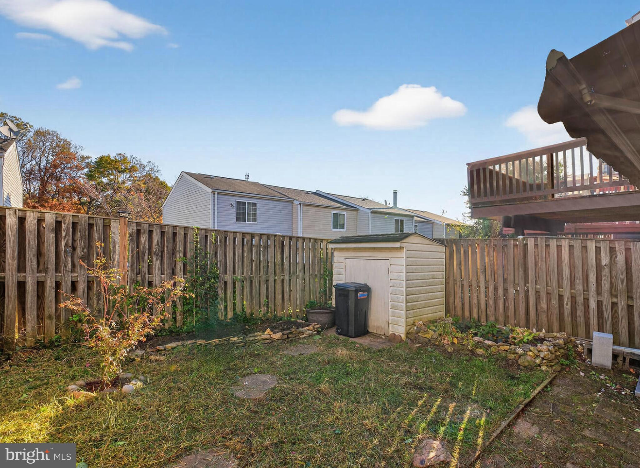 12515 Willow Spring Circle Germantown, MD 20874 - Photo 18 of 22 a view of a house with backyard and sitting area