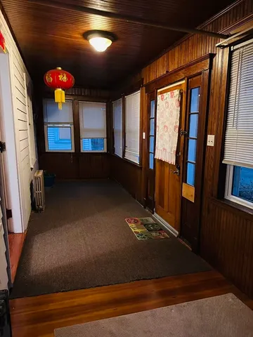 a bathroom with a sink a toilet a mirror and shower