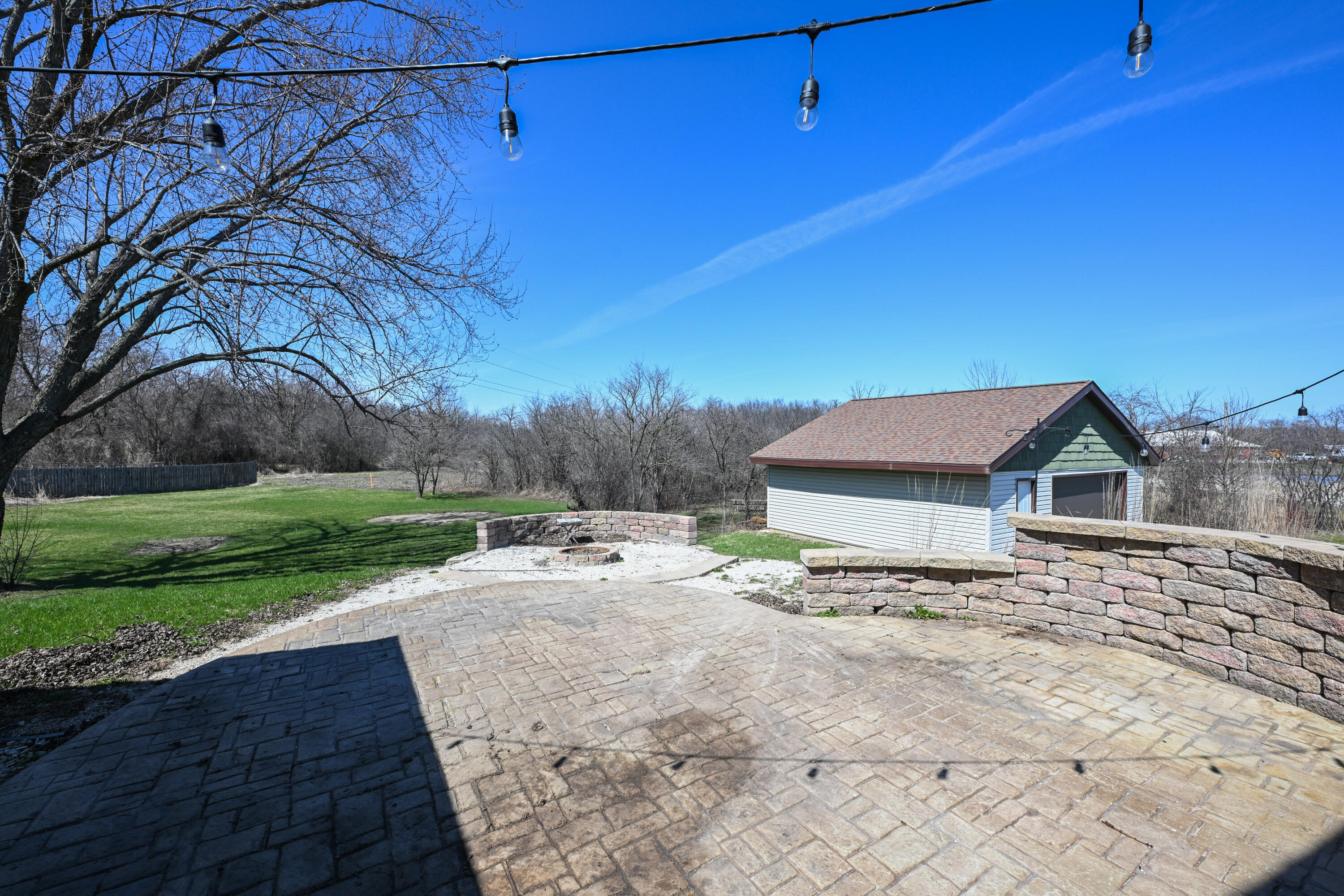 11606 West Ryan Road Franklin, WI 53132 - Photo 32 of 44 brick patio and firepit