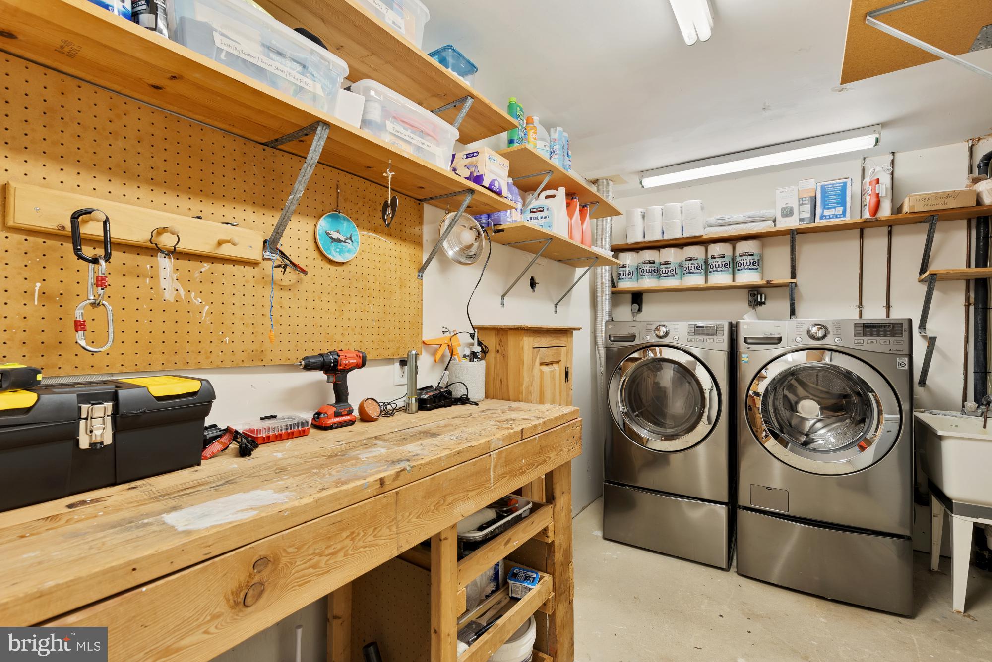 8100 Loving Forest Court Springfield, VA 22153 - Photo 29 of 33 a utility room with dryer and washer