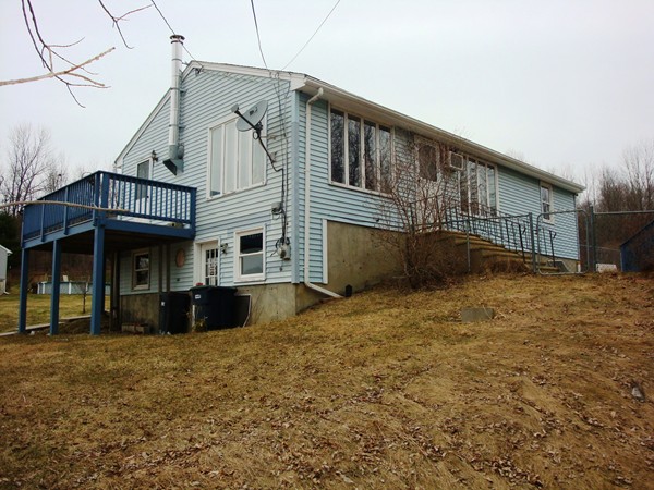 325 Torrey Road Southbridge, MA 01550 - Photo 1 of 25 a view of a house with a yard