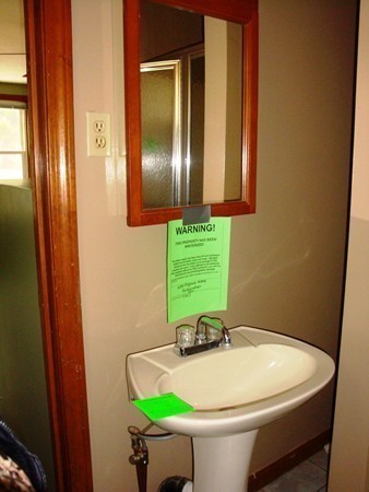325 Torrey Road Southbridge, MA 01550 - Photo 14 of 25 a bathroom with a sink and a mirror