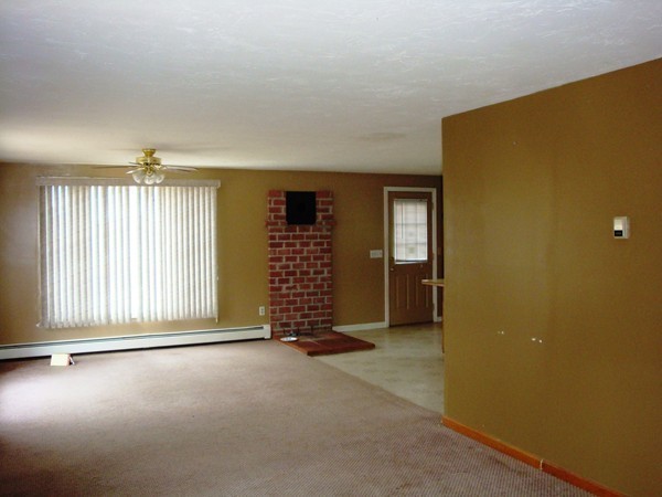 325 Torrey Road Southbridge, MA 01550 - Photo 3 of 25 an empty room with windows