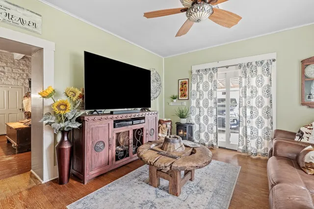 a view of a chairs and table in the patio