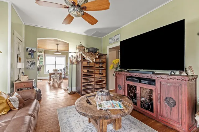 a bathroom with a bathtub and a window