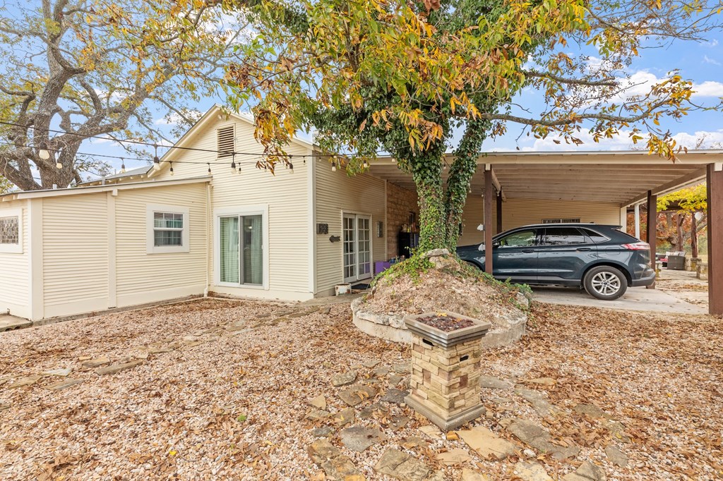 1447 Royal Oaks Loop Fredericksburg, TX 78624 - Photo 19 of 98 a car parked in front of a house