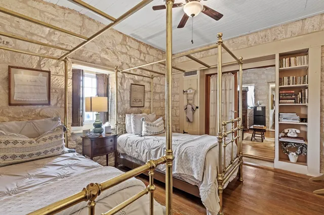 a view of a house with a yard and porch